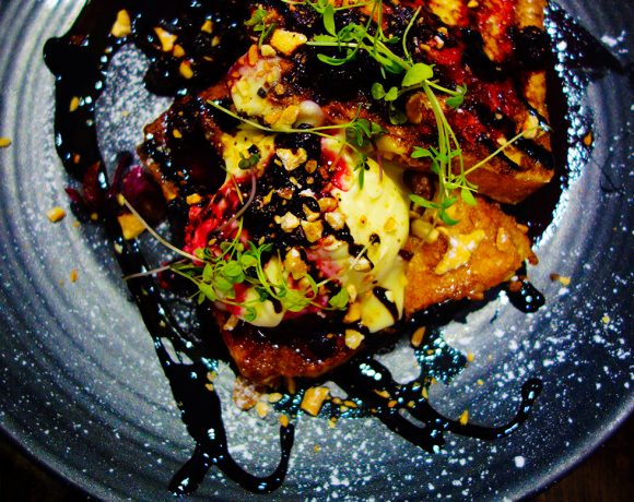 French Toast with bacon, raspberry compote, mascarpone, salted cashew nuts and balsamic glaze